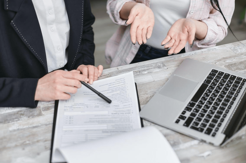 people discussing a document