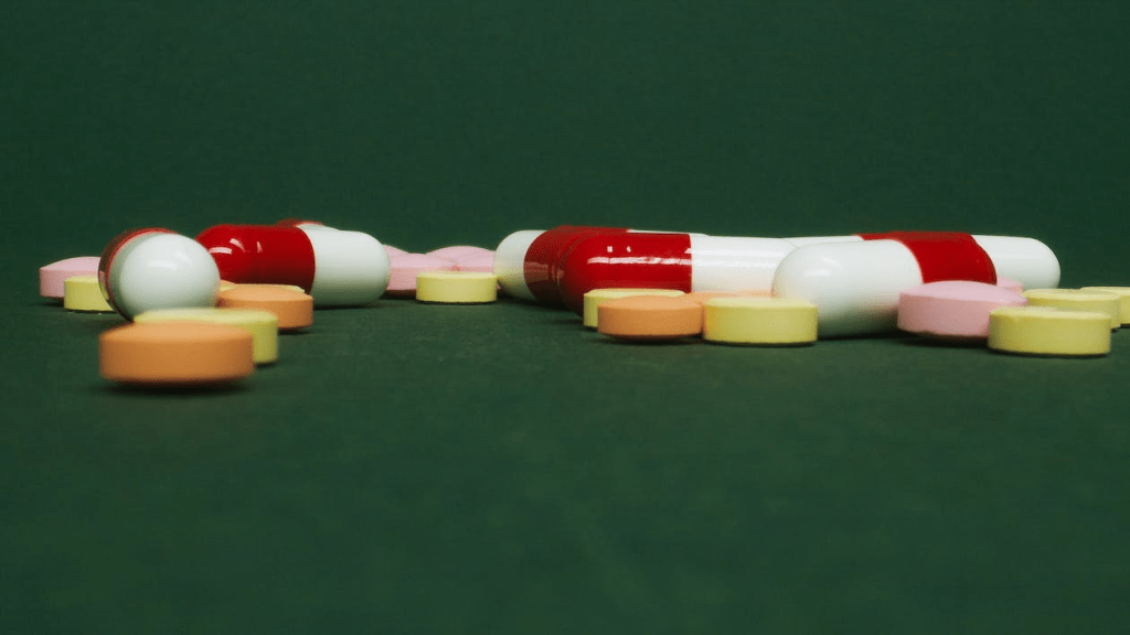 A group of capsules and tablets in a close-up shot