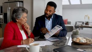 Elderly woman discussing Medicare Savings Program