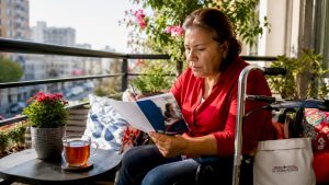 Woman reviewing disability dental insurance materials