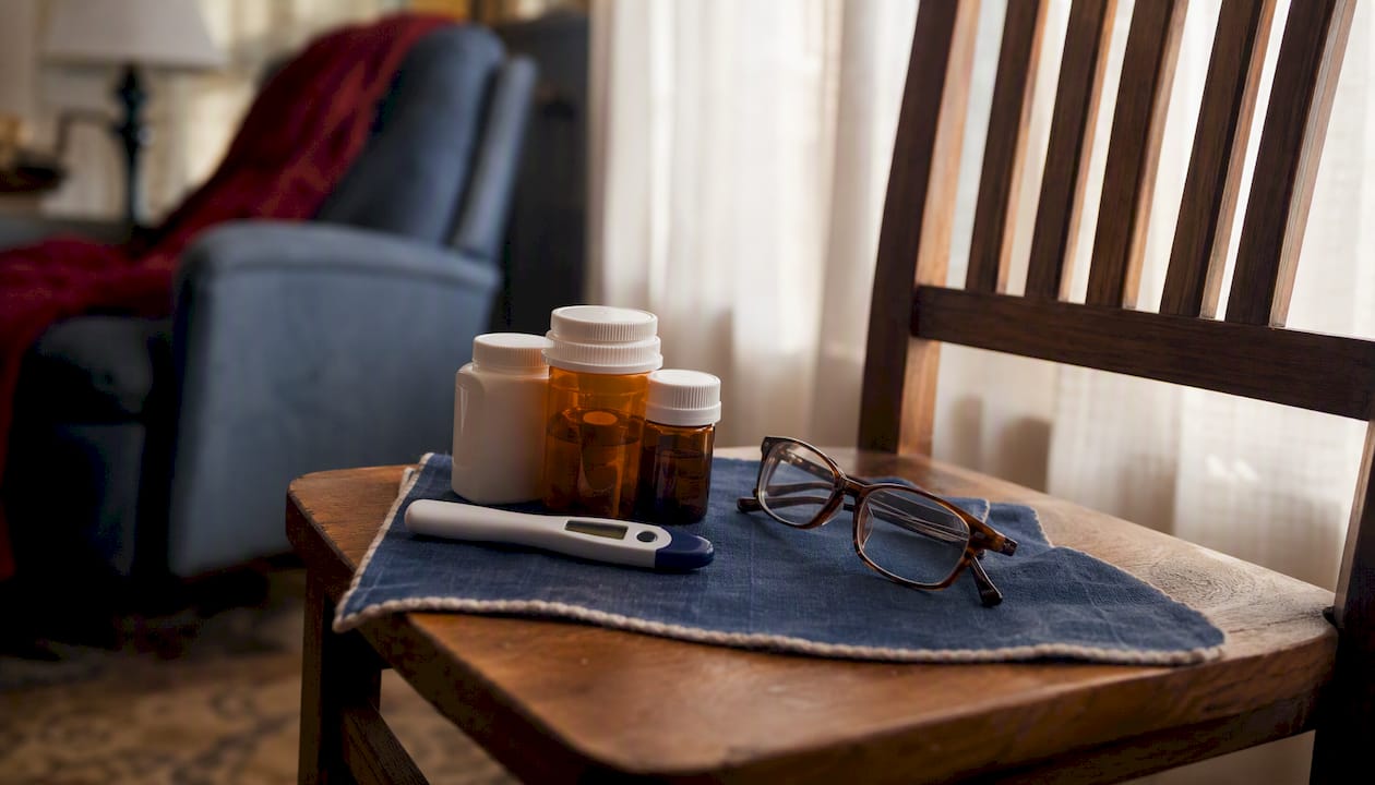 Medical supplies on senior's bedside table