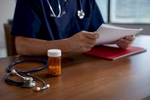 Prescriber reviewing medication history for exception