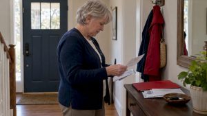 Older adult reviewing a Part D penalty bill